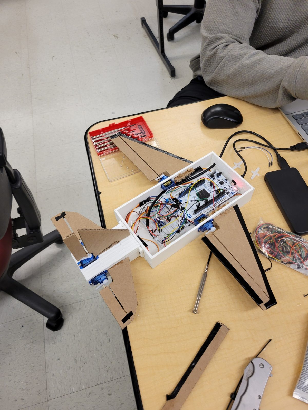 The SteadiFly during assembly, showing the internal electronics and wiring before the airframe was closed up.